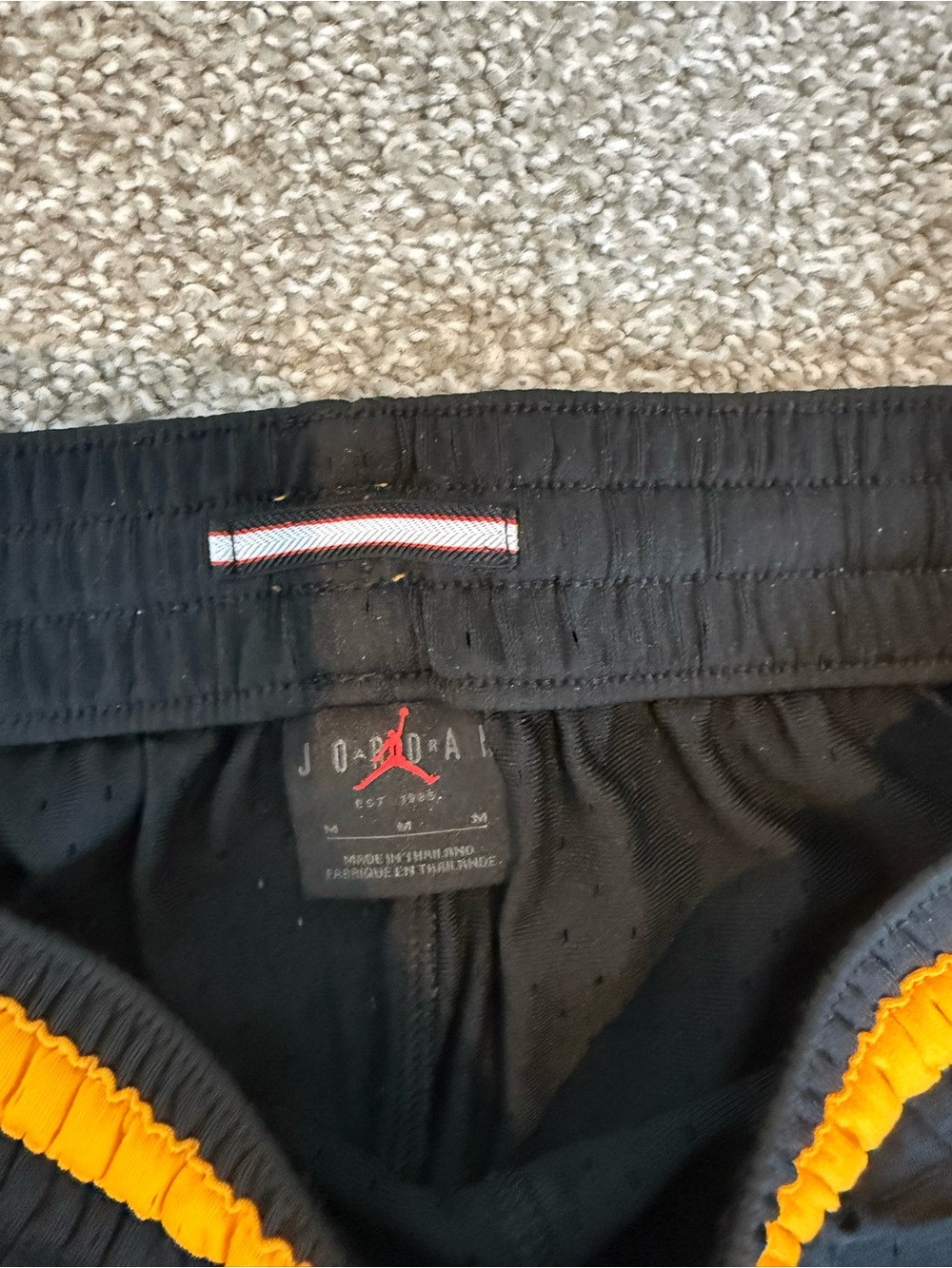 Jordan Black Shorts with Orange and Yellow Trim - Picture 2 of 4
